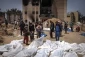 Gaza mass graves prompt calls for justice