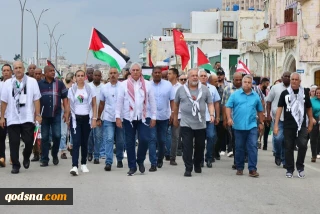 رئیس‌جمهور کوبا با چفیه در راهپیمایی حمایت از فلسطین