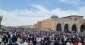 Tens of thousands of Palestinians perform Friday prayer at the Aqsa Mosque