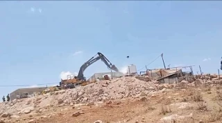 Zionist regime issues new demolition orders for school and homes in Yatta
