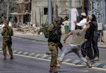 Several towns across the West Bank witnessed a new escalation in settler attacks on Friday, resulting in injuries and widespread property damage.